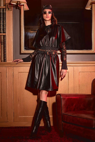 Imitation leather dress with a smoked waistline.